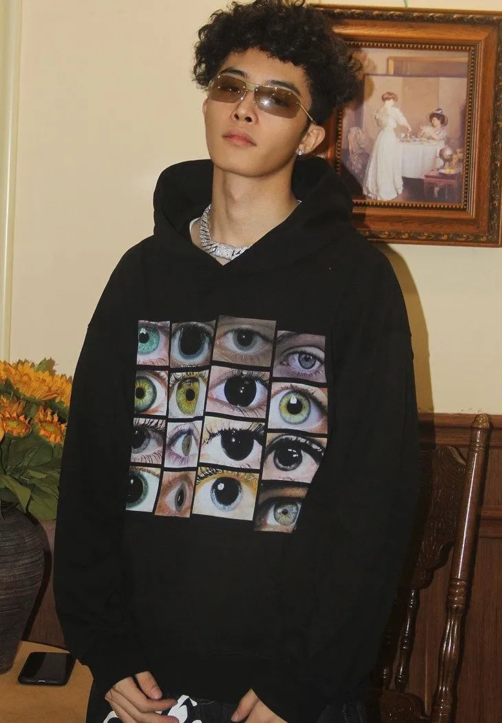 Sure, heres an optimized title for the product:

Stylish Eye Graphic Photo Hoodie - Comfortable & Trendy Sweatshirt